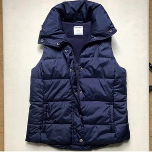 Women’s Puffer vest. Lightly worn. Zipper enclosure with outer snap covering.